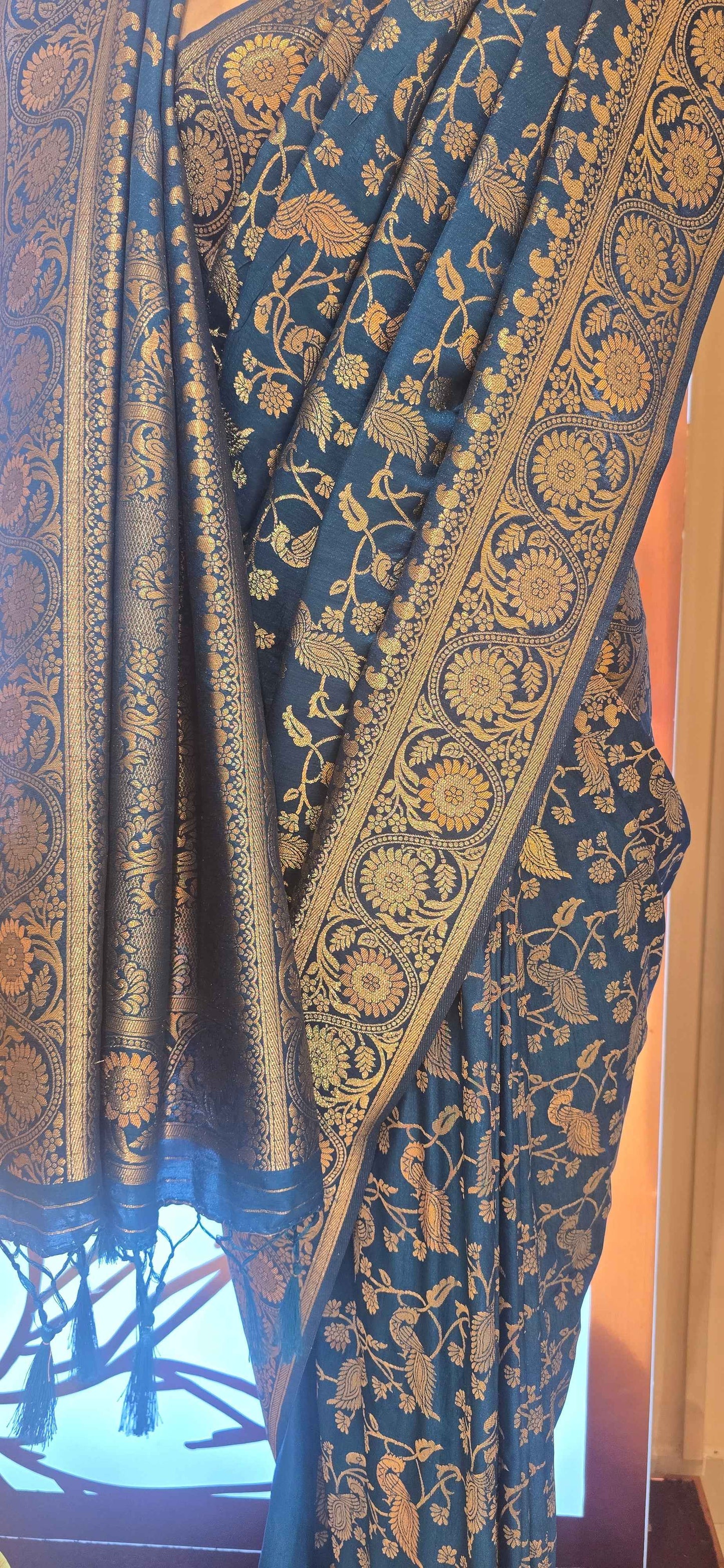 Banarasi material peacock blue color saree with jawl design and rich pallu