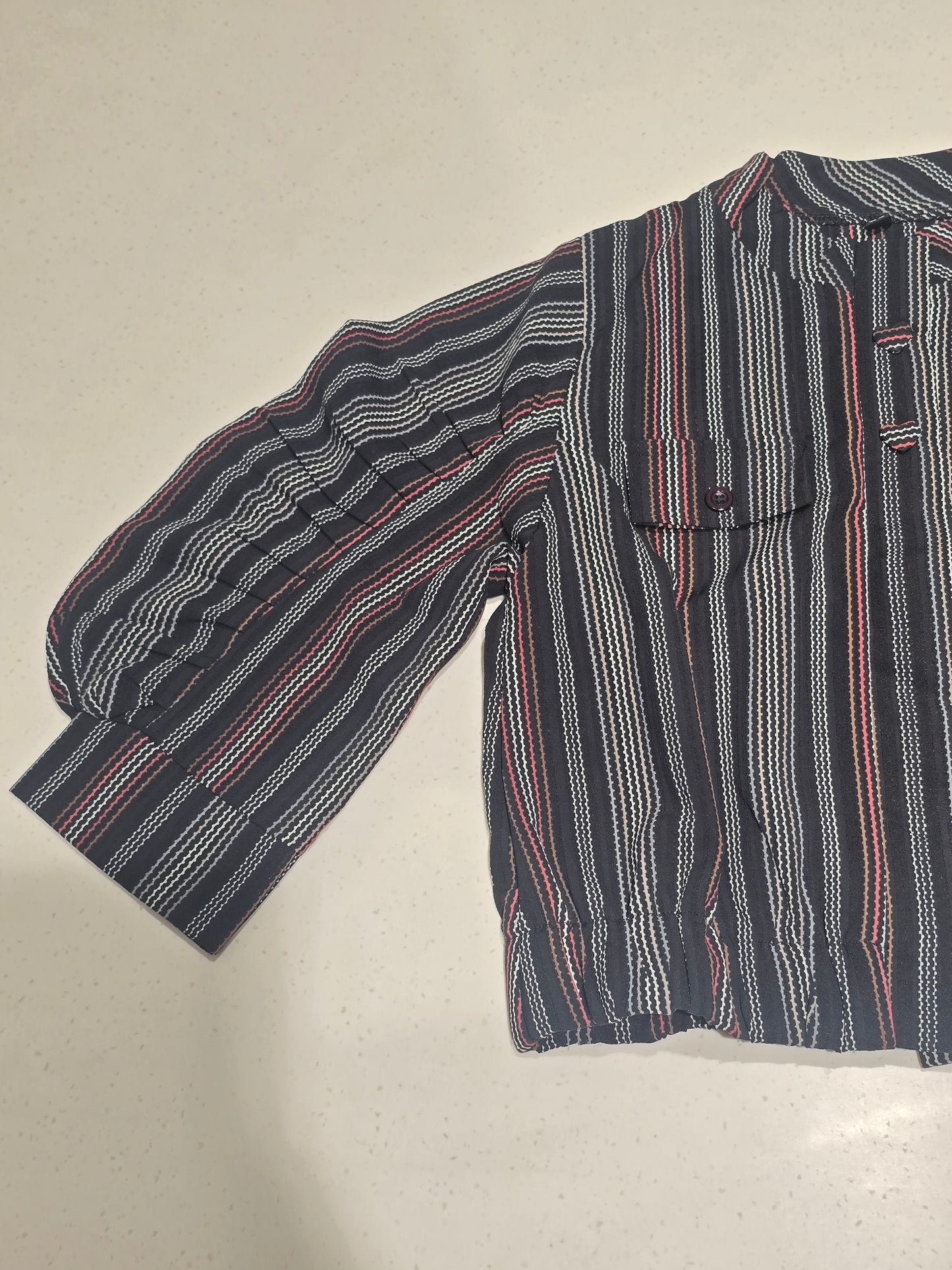 girls' casual striped oversized pullover top featuring a henley-style collar button placket