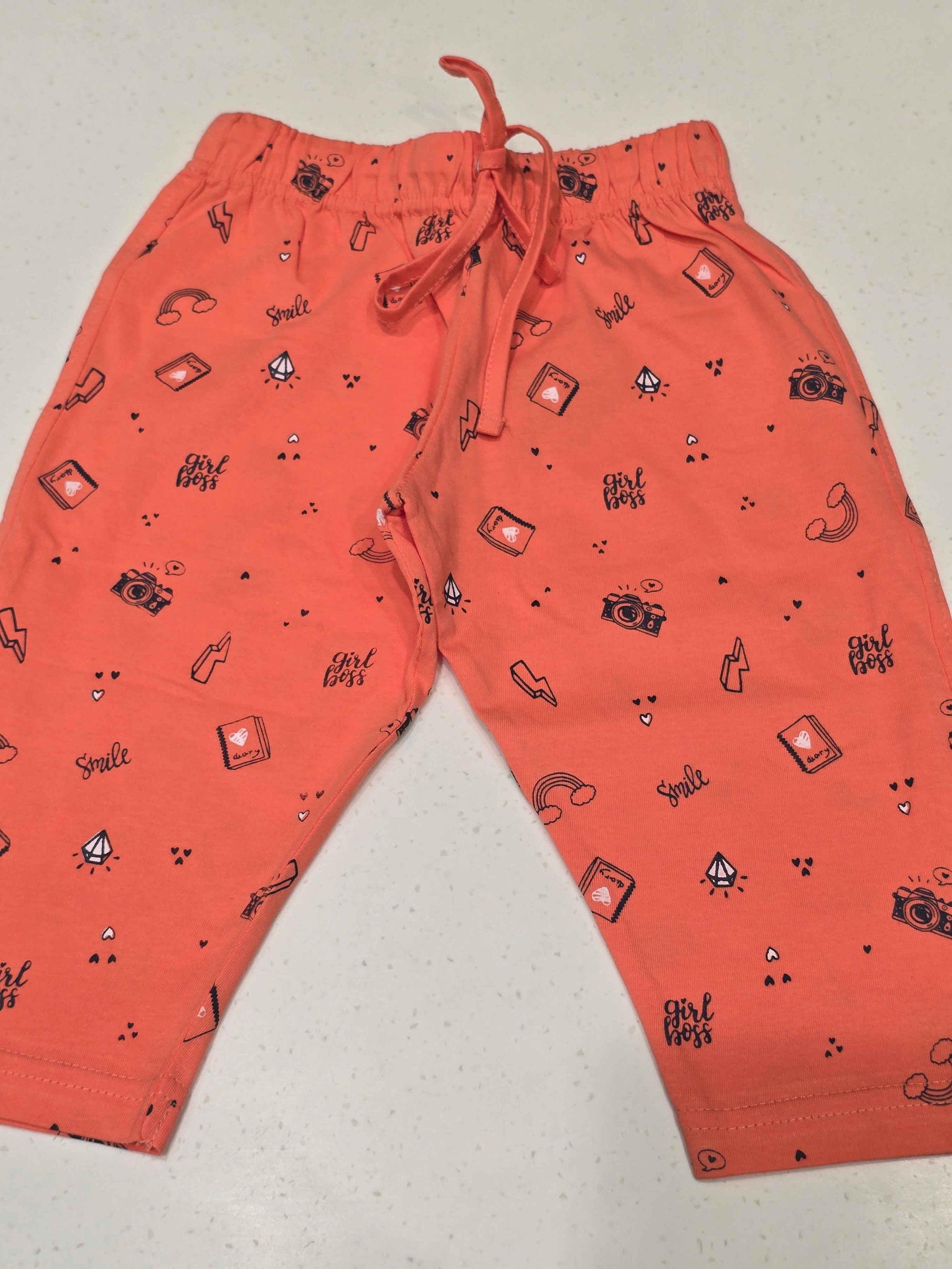 Printed Cotton material orange color capri for girls