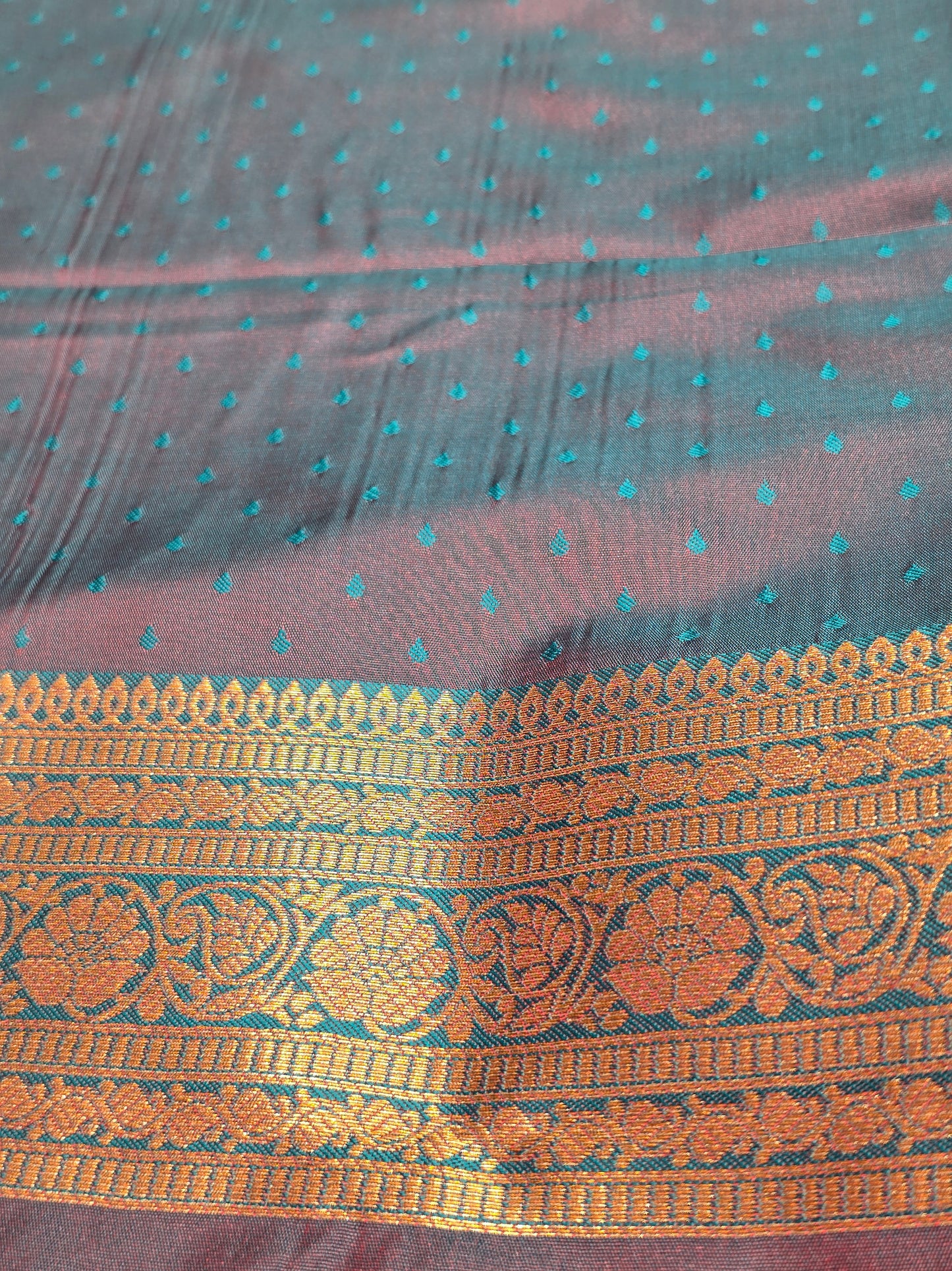 Semi soft silk with butta across the body rich pallu , traditional border