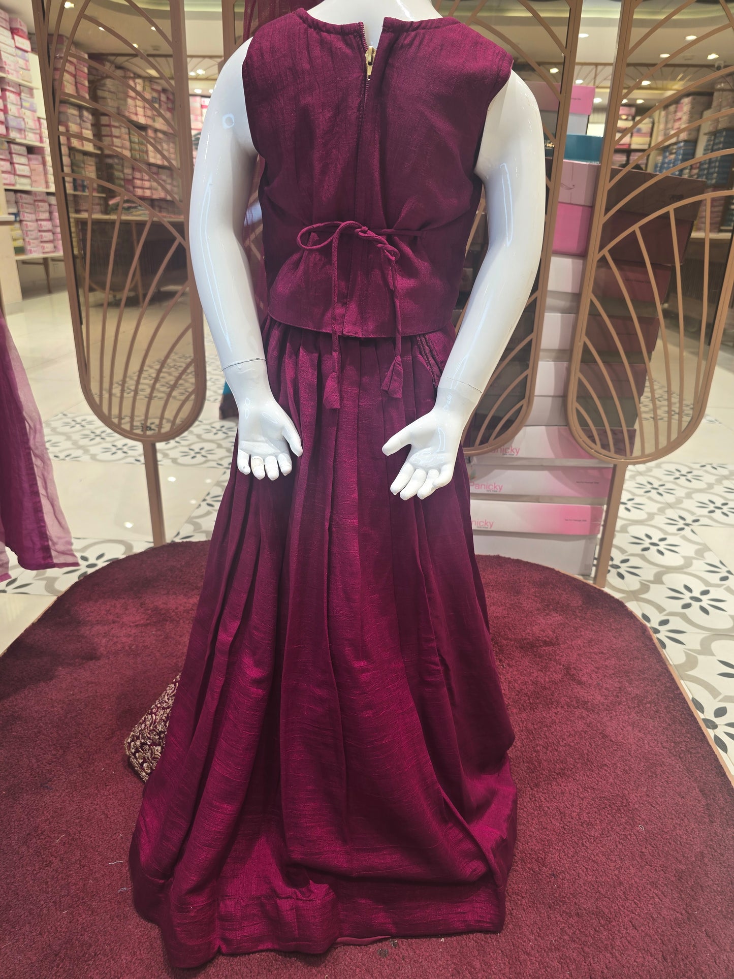 Chinon maroon colored ethnic wear with thread work and small butta for skirt with gold embroidery work for border