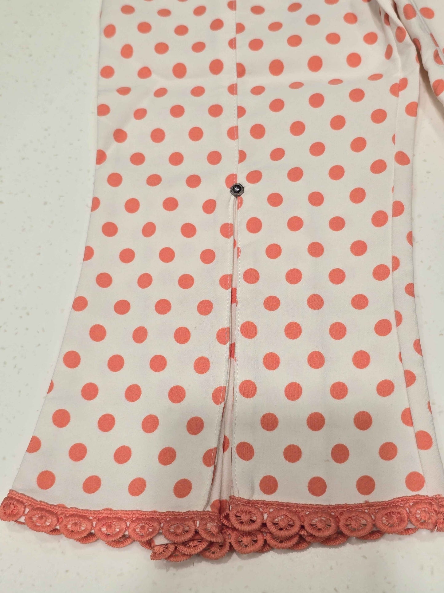 Cotton material white based with peach polka dots