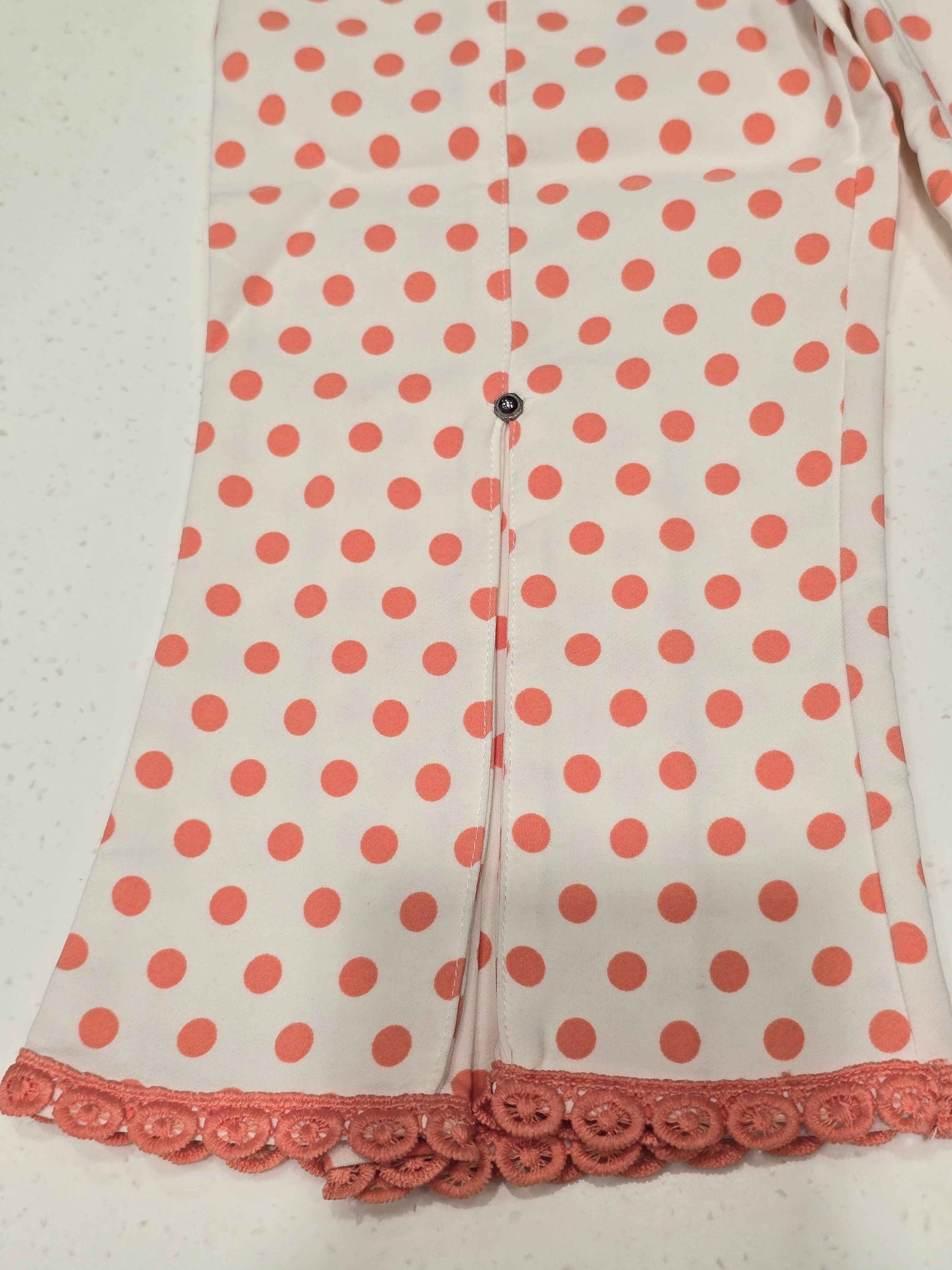 Cotton material white based with peach polka dots