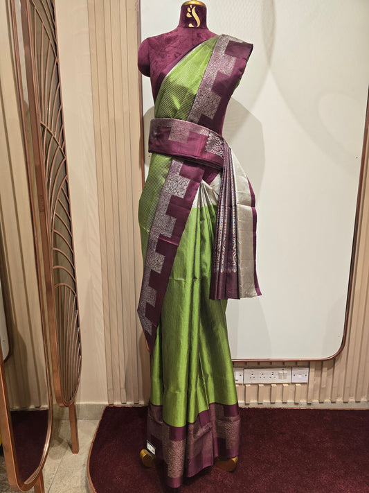 South Indian Kanchipuram silk saree styled with a distinctive modern grid-patterned layout border