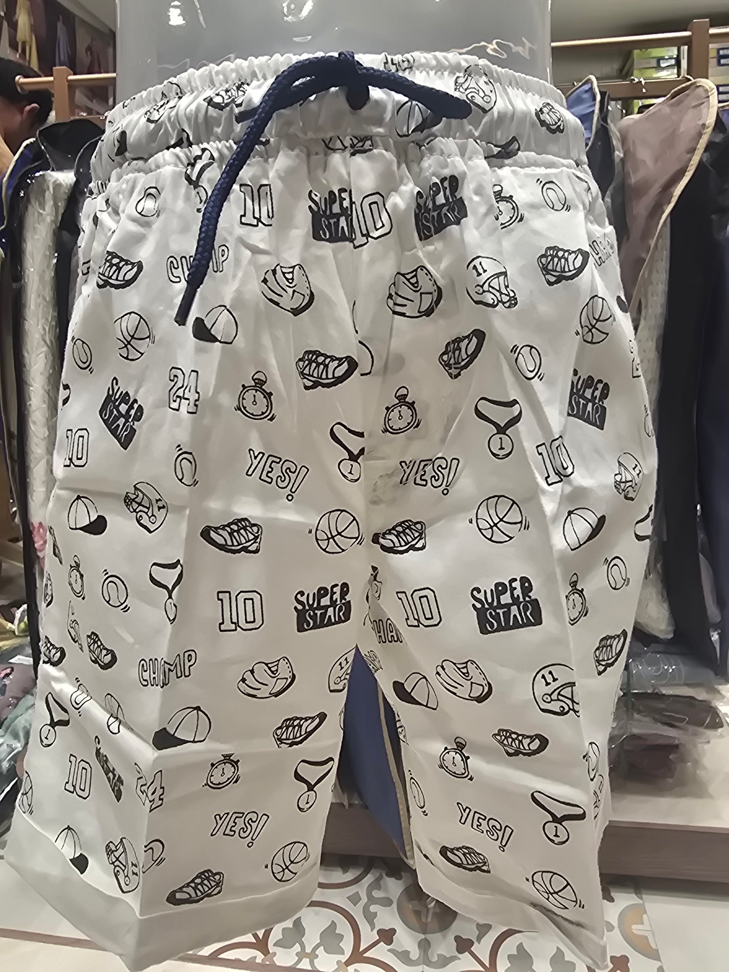 White Cotton Shorts for Boys with Black Printed Design, Round Elastic Waistband, Pockets and Adjustable Tie