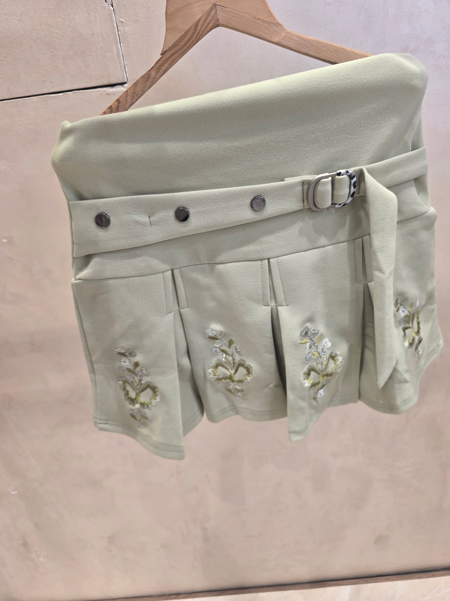 Girls Lycra Casual Wear Mini Skirt in Pista Green with Stylish Printed Border and Designer Belt for Summer Wear
