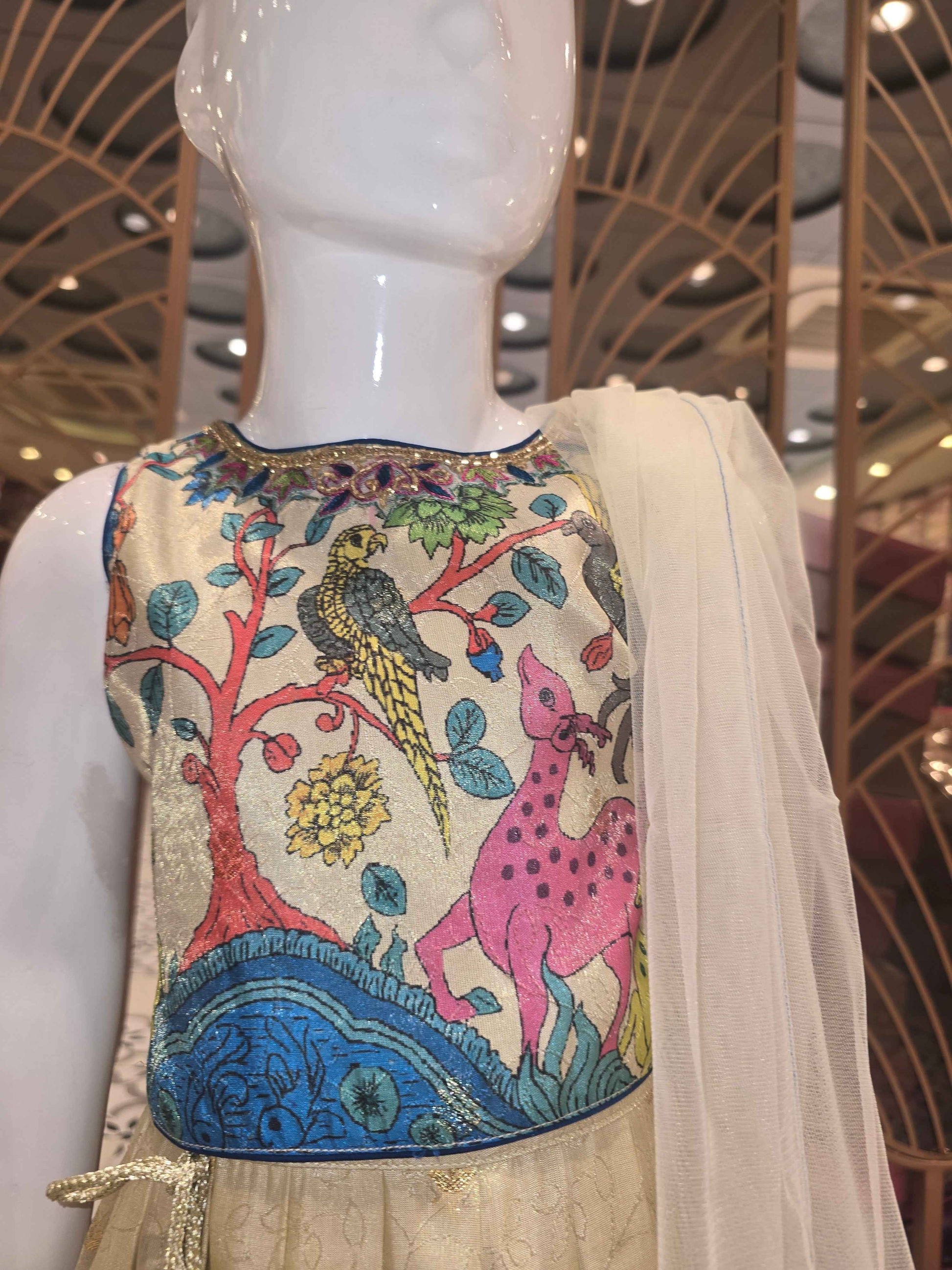 Banarasi material cream colour traditional kalamkaari gaghra with  beats work on round neck