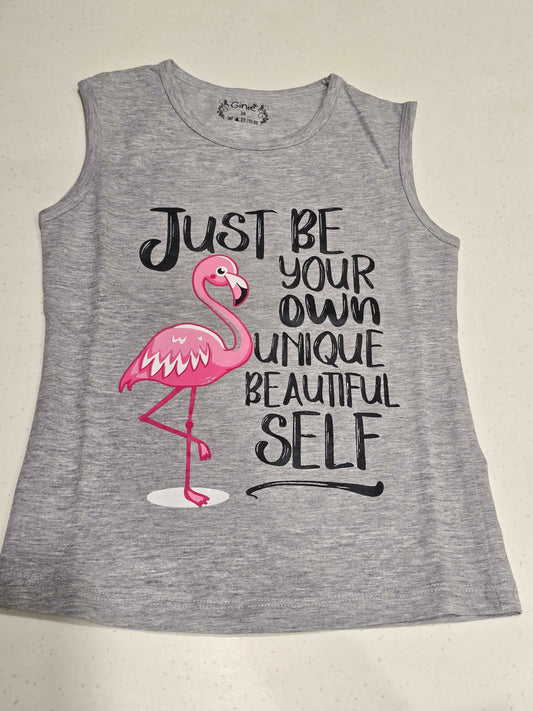 grey sleeveless graphic top or dress featuring a pink flamingo illustration alongside the motivational quote,