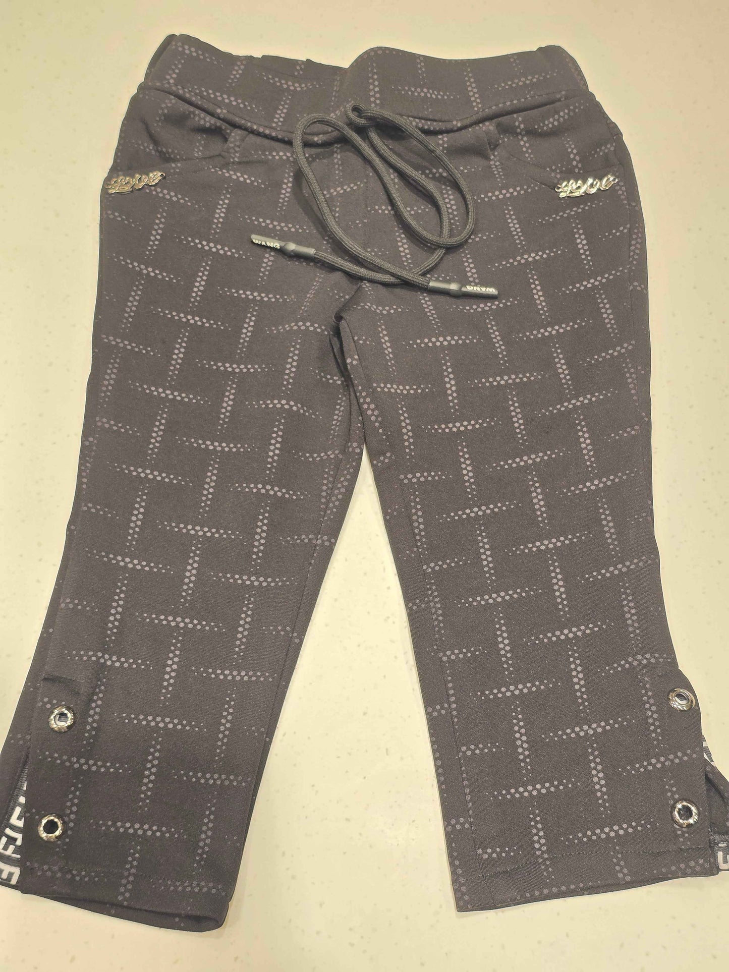 Stretchable material black colour ¾ with checked pattren