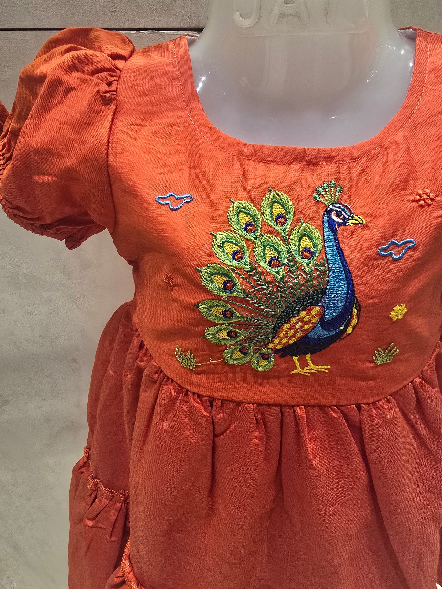 Orange Cotton Short Frock with Peacock Embroidery & Puff Sleeves – Casual Wear for Girls