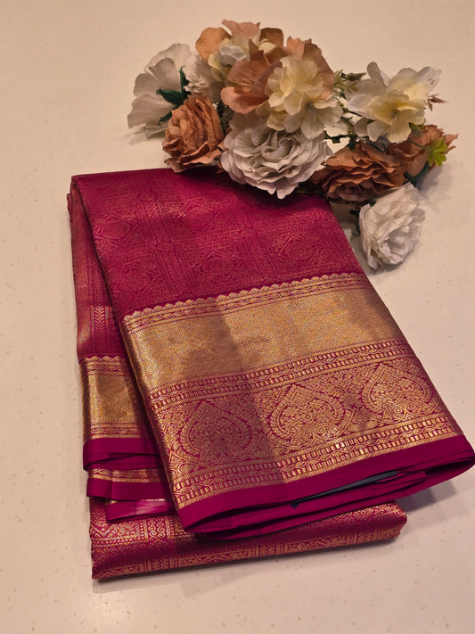 Exclusive Pure Handloom Kanjivaram Silk Saree with Rudrakshi Style Motifs, Traditional Leaf Designed Border and Rich Pallu for Wedding Occasions