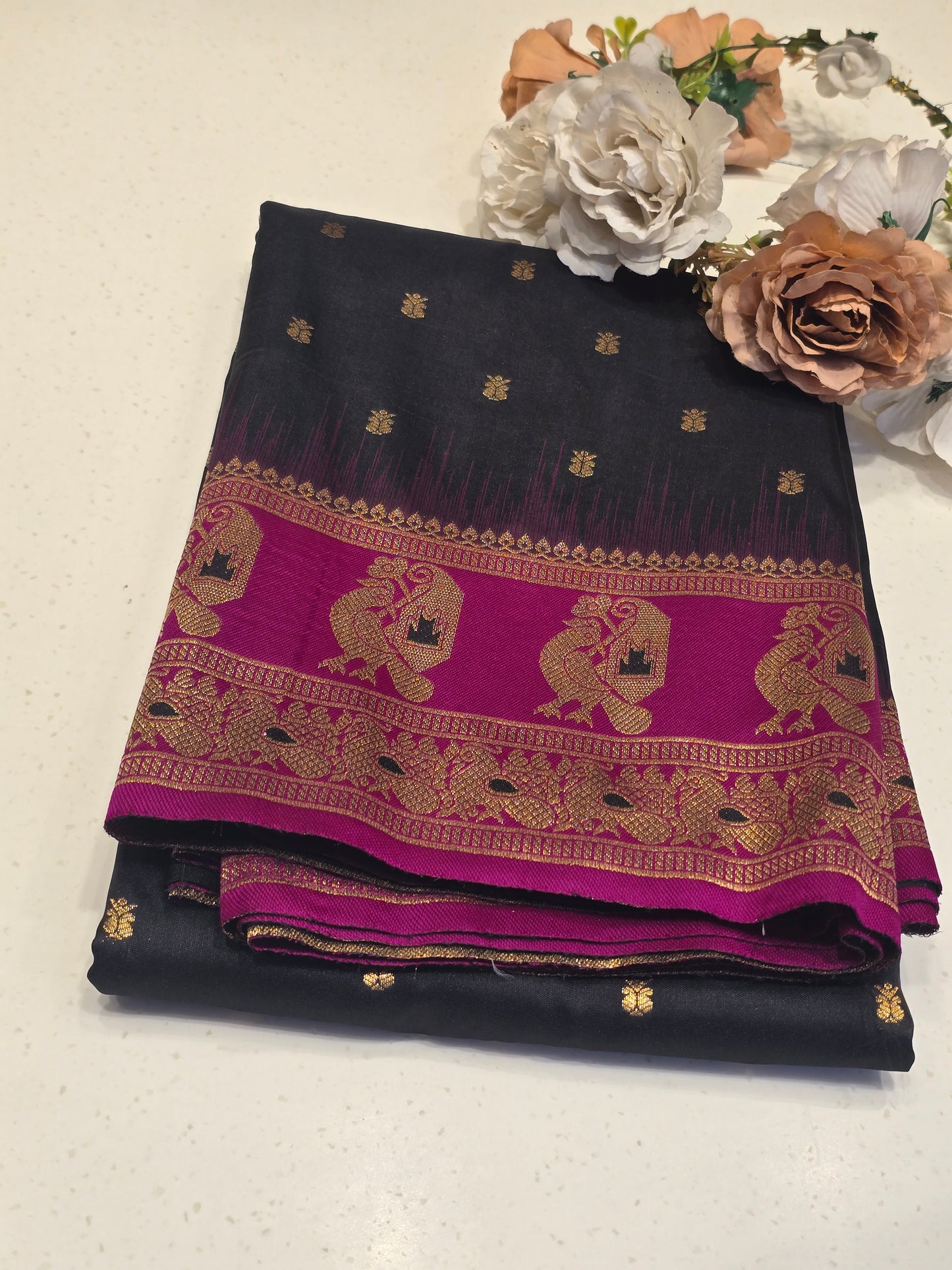 Semi soft silk with butta across the body rich pallu , traditional border