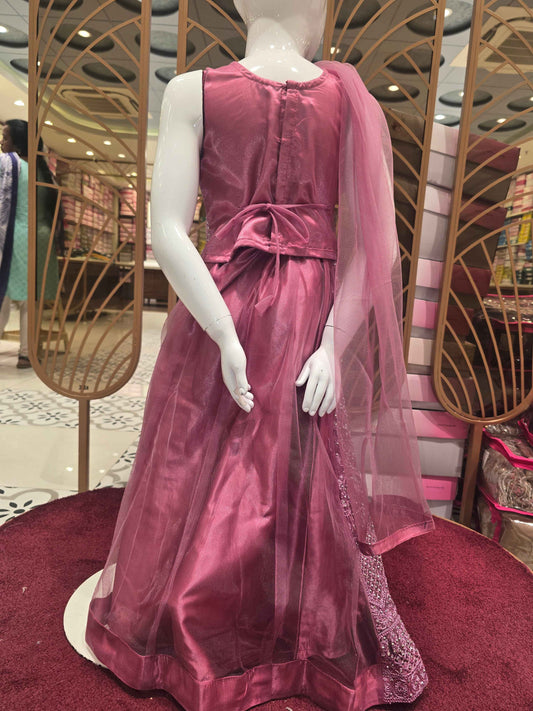 Knitted materail onion pink colour gaghra choli. Embroidery with stone fancy work on front side with round neck