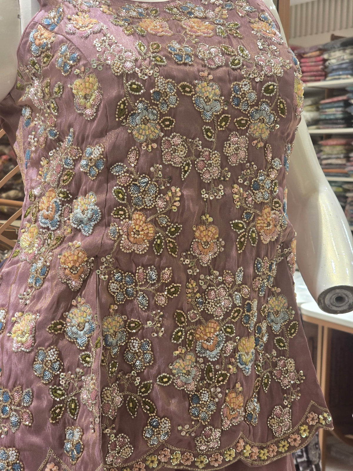 mauve peplum sharara suit.