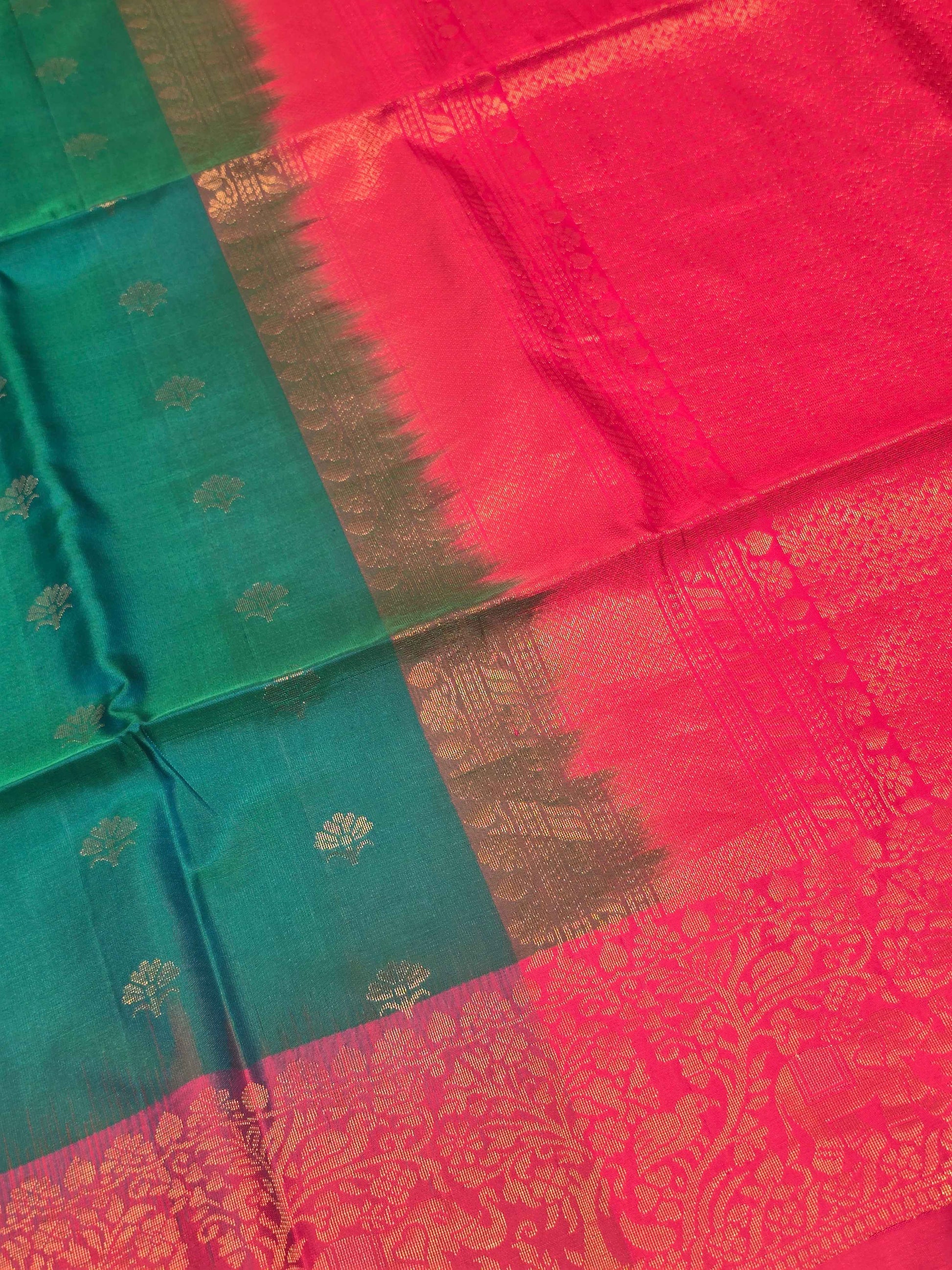 Pure softsilk peacock with pink colour saree and traditional border