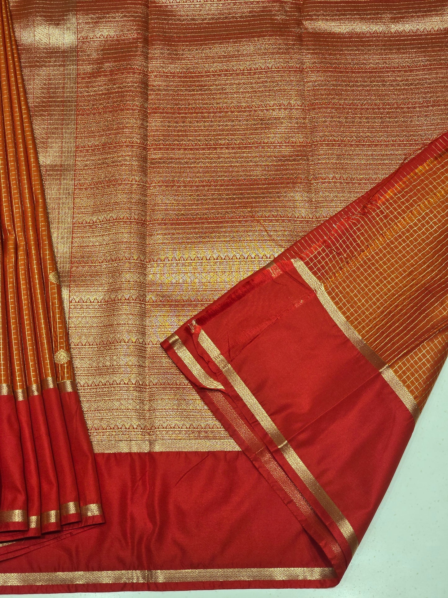 Semi kanjivaram saree with checked pattren and betex border