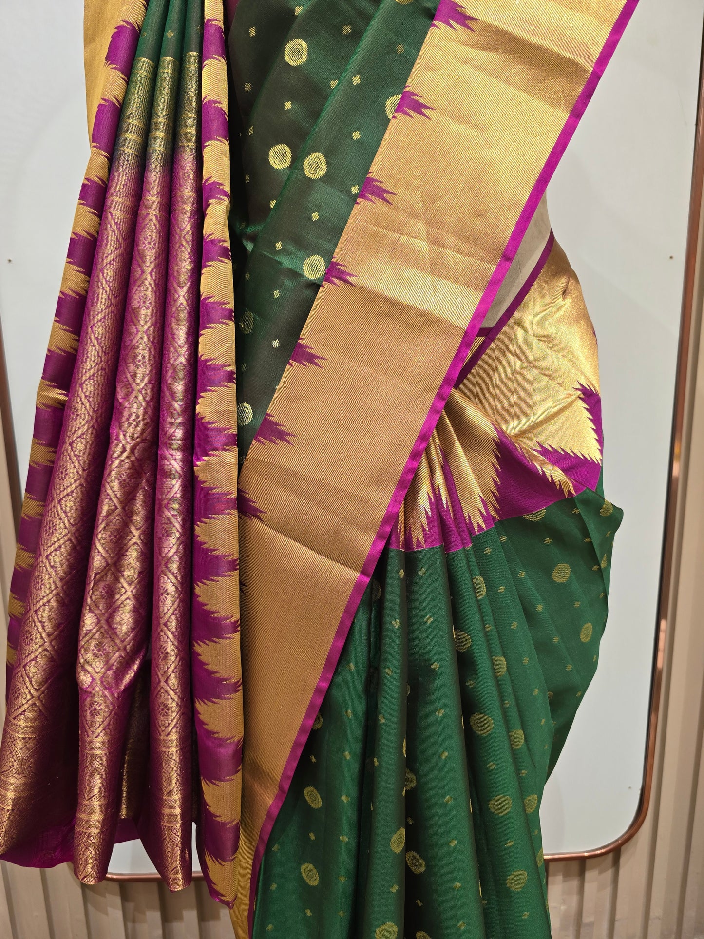 Pure handloom Kanjivaram silk saree with temple border and traditional motifs