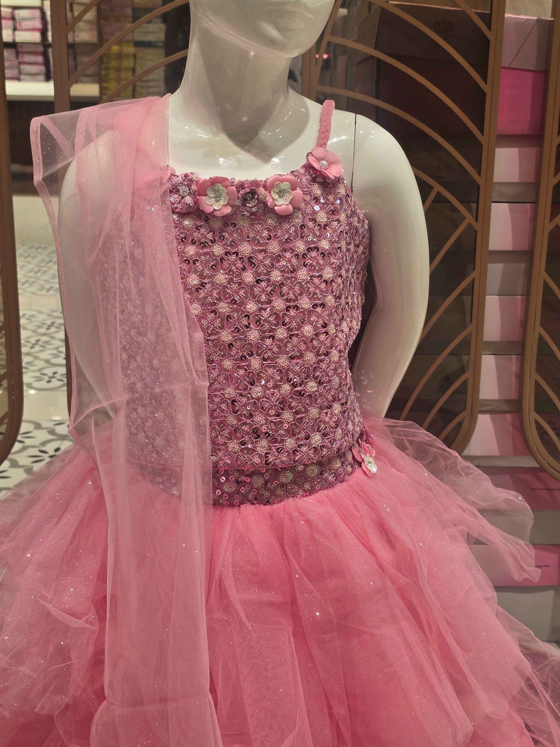 Knitted material baby pink colour traditional wear with sequence work,peghetti shoulder and Step by step gaghra