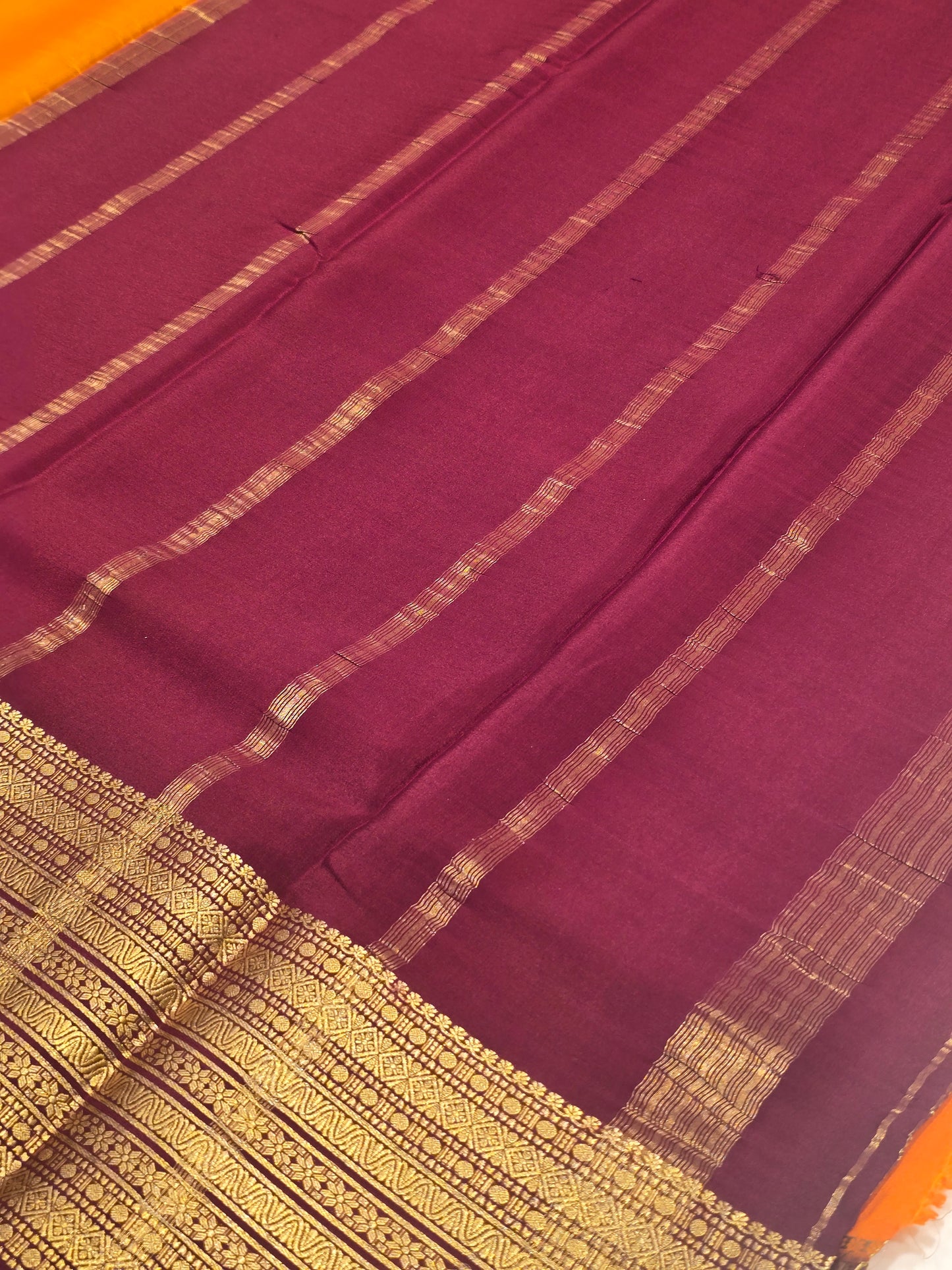 Pure mysore crepe silk with contrast blouse and kaddi pallu , traditional border