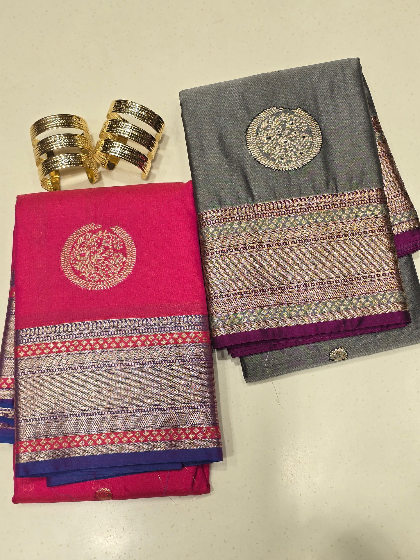 Semi kanjivaram saree with gatti border and traditional motifs