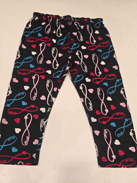 a pair of printed lounge pants or leggings featuring an infinity loops,